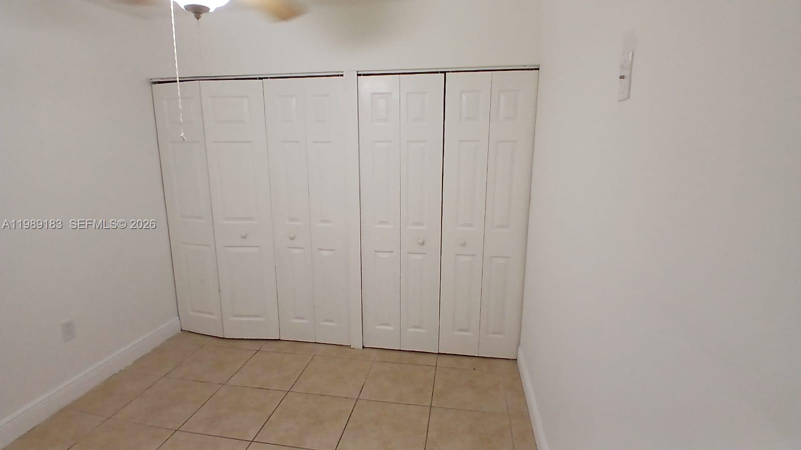 8782 Southwest 12th Street, Unit 208 Miami, FL 33174 - Photo 10 of 16 a view of a closet