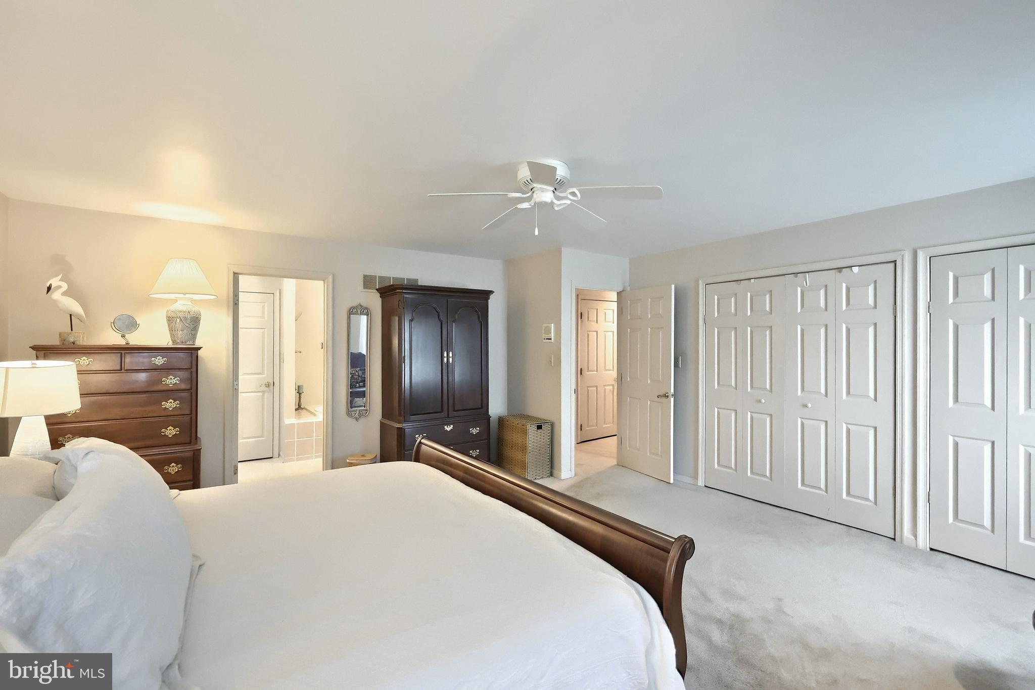 355 Sachs Road Gettysburg, PA 17325 - Photo 16 of 49 a bedroom with a large bed and a chandelier