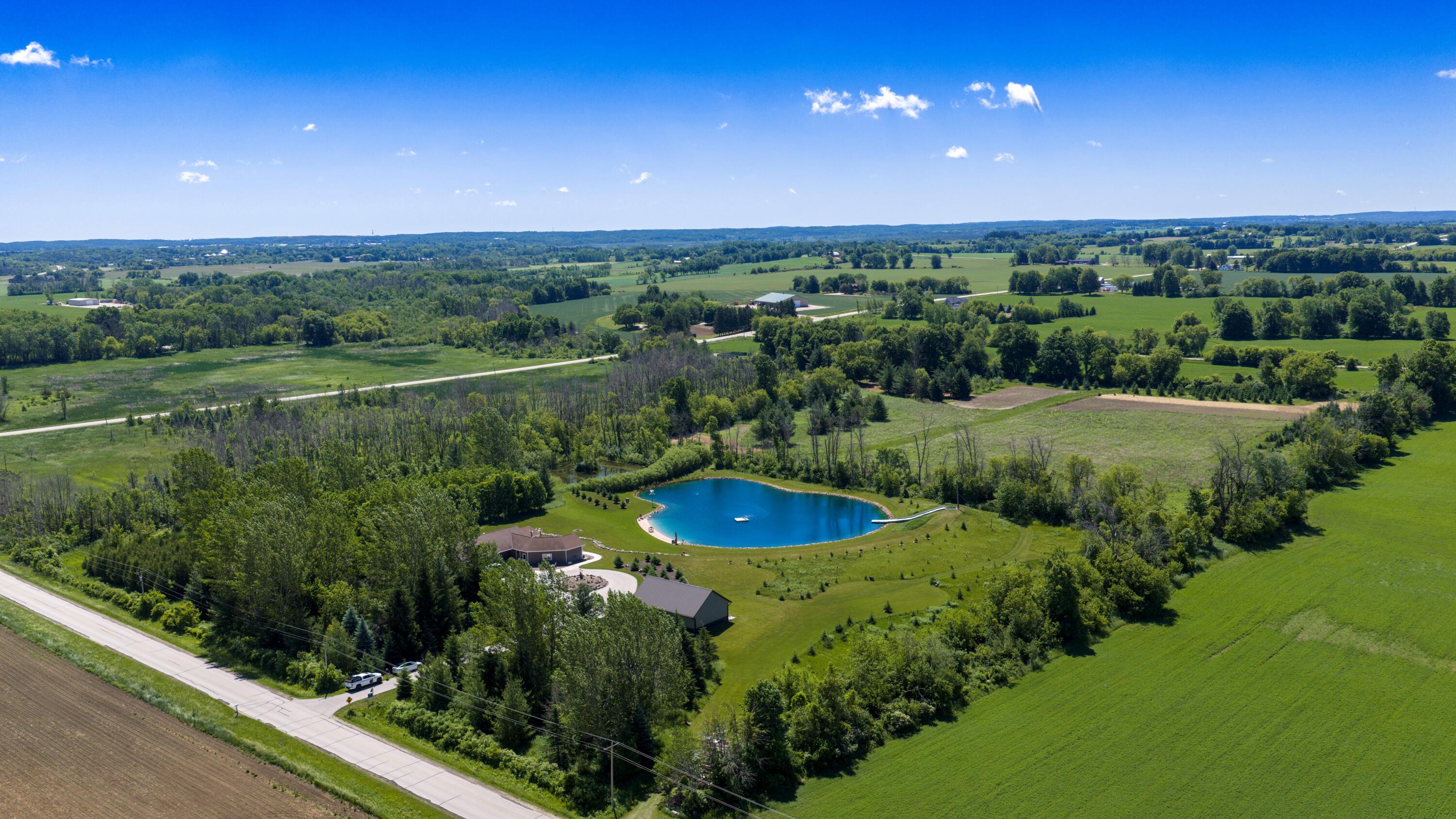 W985 Fur Farm Road New Holstein, WI 53061 - Photo 53 of 57 DJI_20260612110458_0522_D