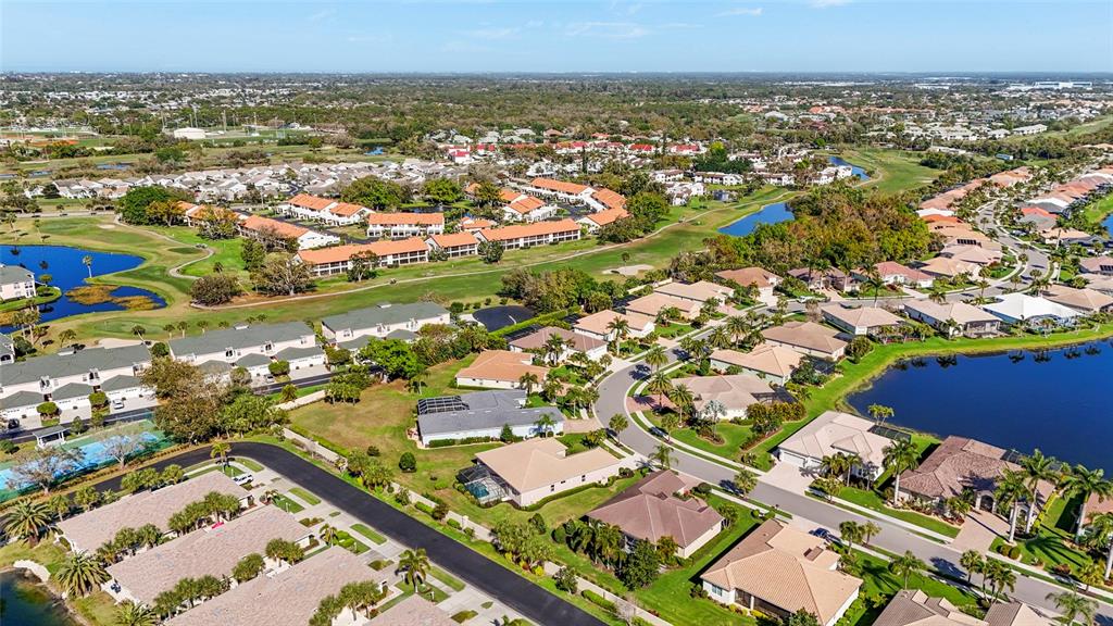 357 Marsh Creek Road Venice, FL 34292 - Photo 48 of 70 an aerial view of residential houses with outdoor space