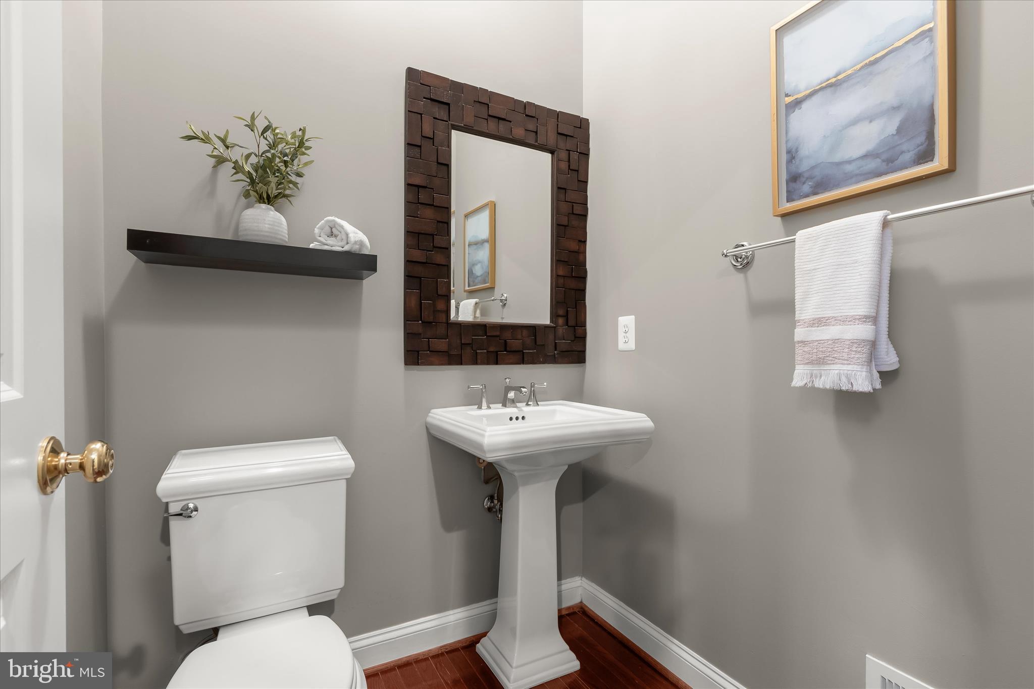 7650 Midtown Road Fulton, MD 20759 - Photo 14 of 76 a bathroom with a toilet sink and mirror