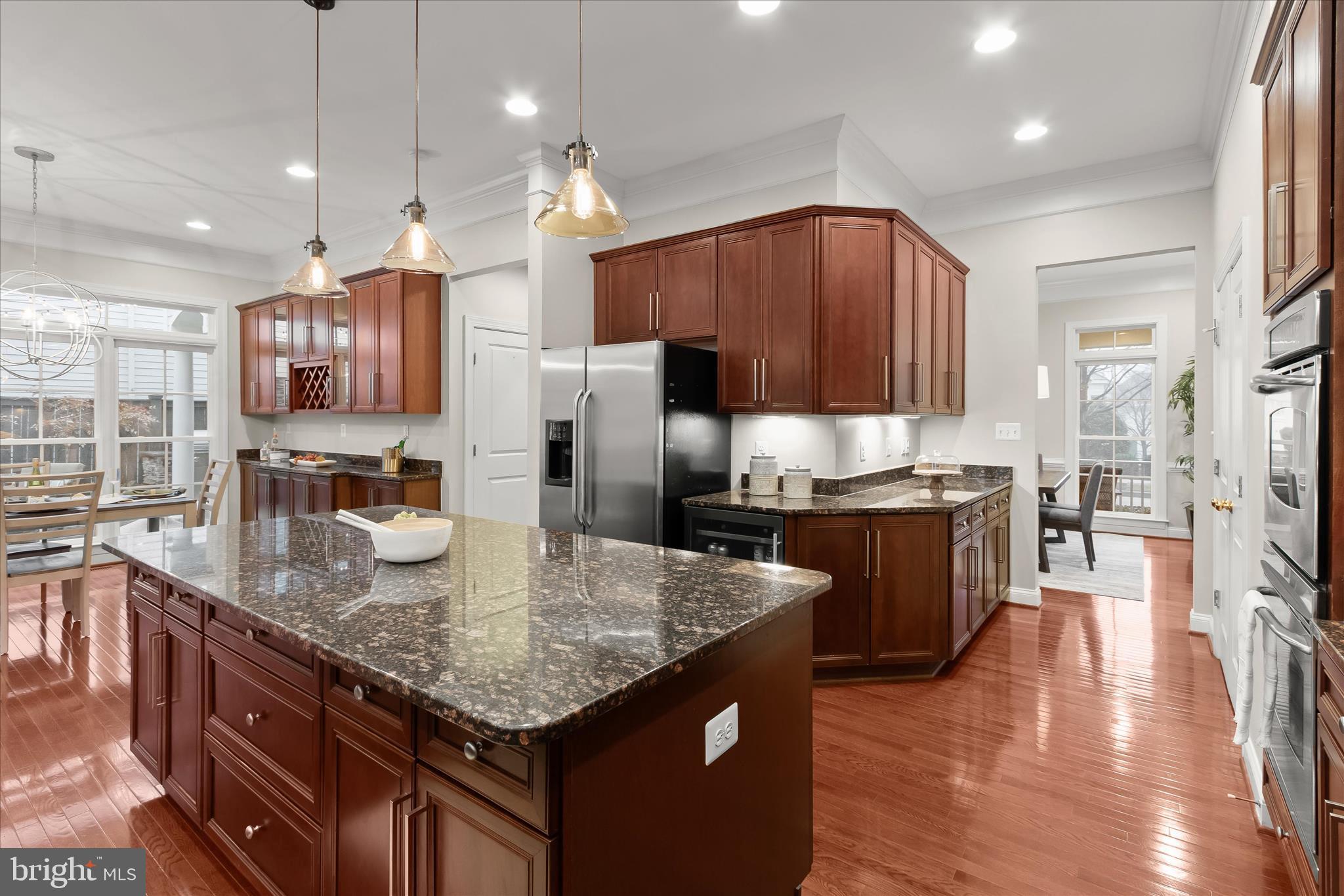 7650 Midtown Road Fulton, MD 20759 - Photo 17 of 76 a kitchen with stainless steel appliances granite countertop a sink refrigerator and cabinets