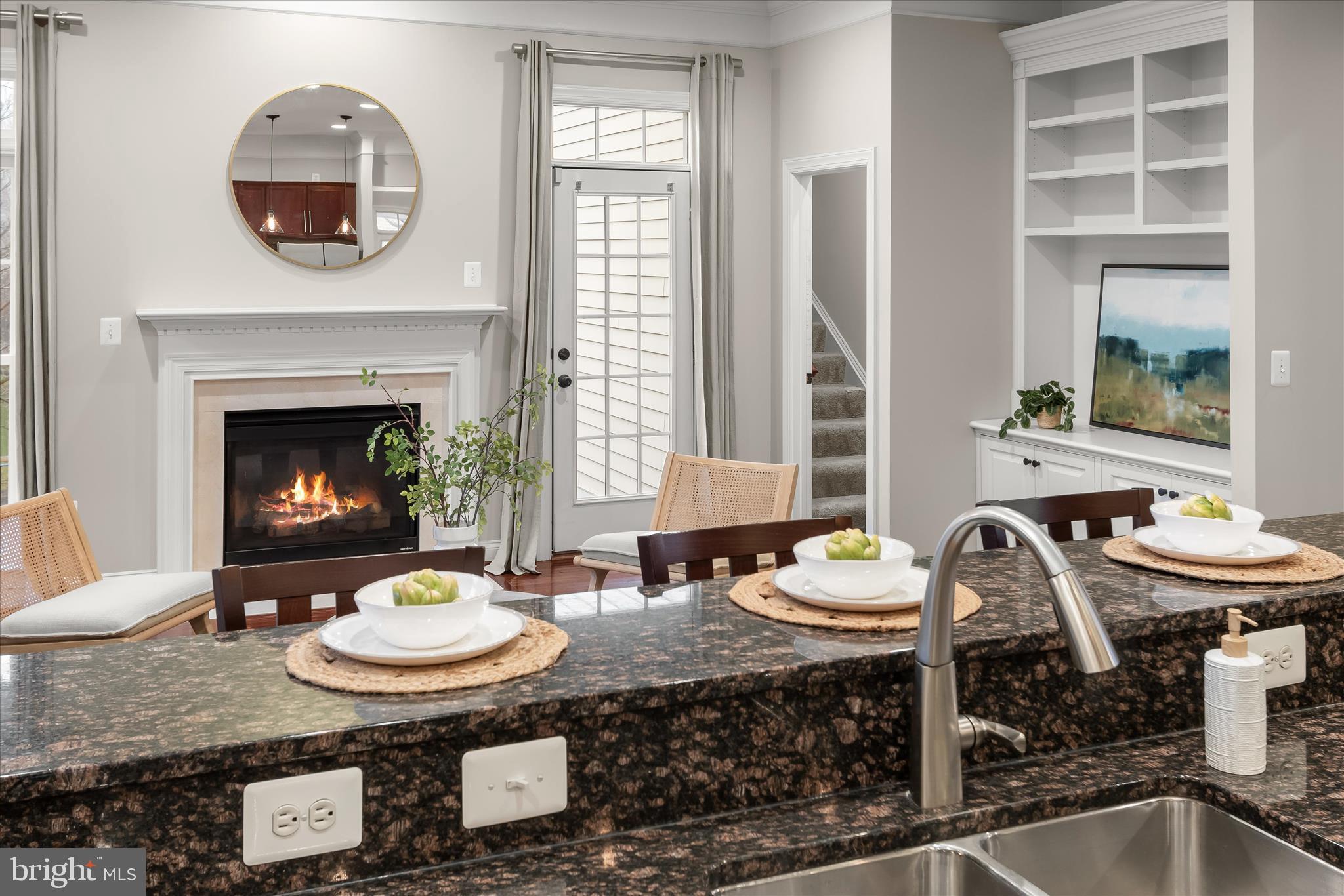 7650 Midtown Road Fulton, MD 20759 - Photo 20 of 76 a living room with furniture and a fireplace