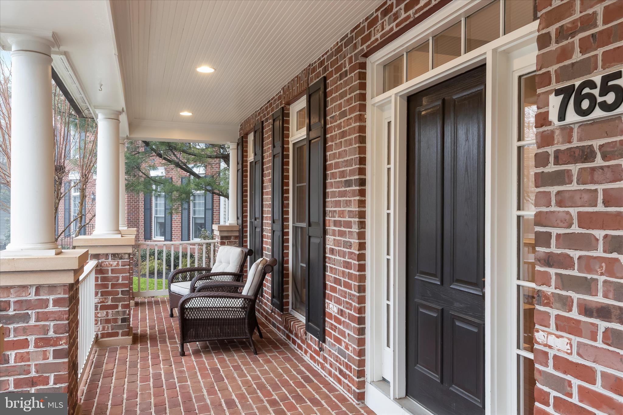 7650 Midtown Road Fulton, MD 20759 - Photo 2 of 76 a balcony with furniture and wooden floor