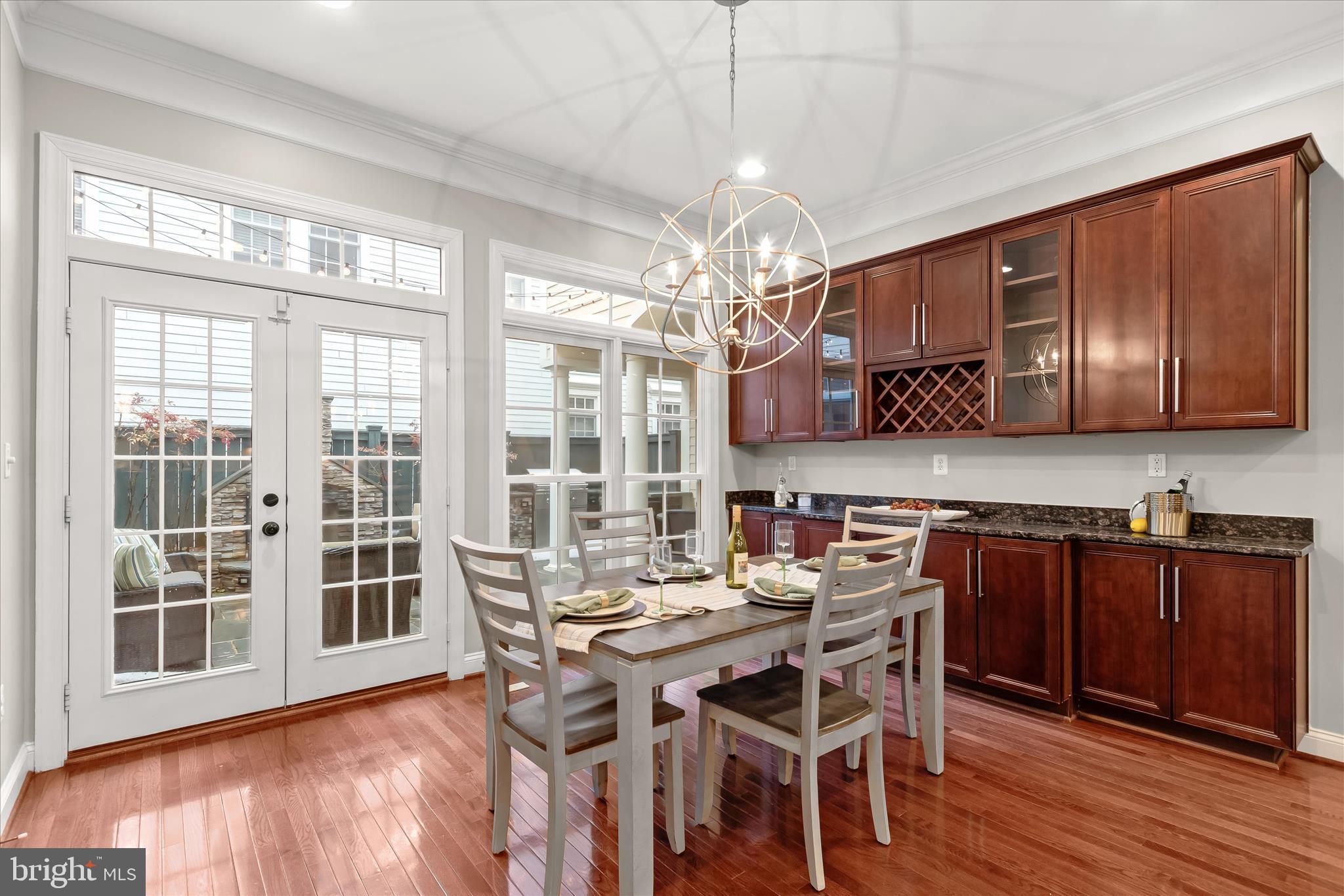 7650 Midtown Road Fulton, MD 20759 - Photo 21 of 76 a view of a dining room with furniture large window and wooden floor