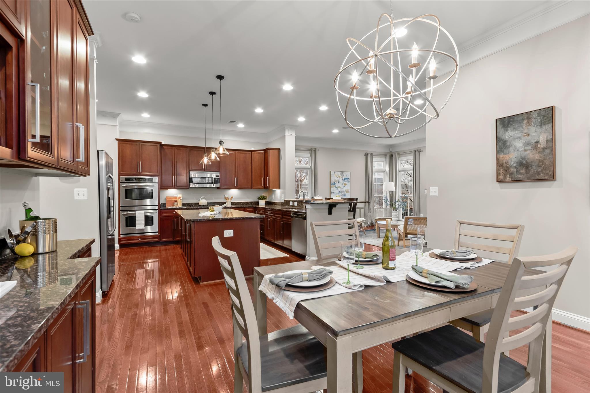 7650 Midtown Road Fulton, MD 20759 - Photo 23 of 76 a kitchen with a dining table and chairs