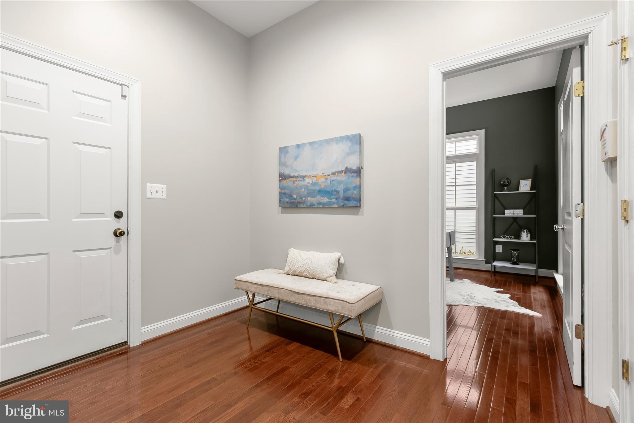 7650 Midtown Road Fulton, MD 20759 - Photo 29 of 76 a living room with furniture and a wooden floor