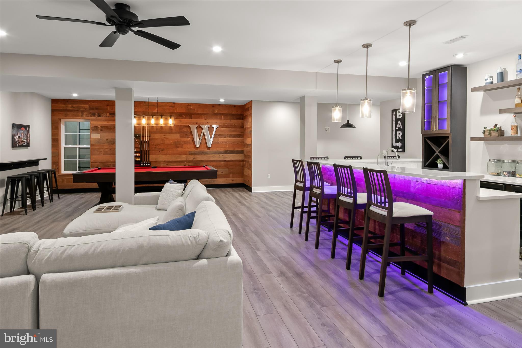 7650 Midtown Road Fulton, MD 20759 - Photo 33 of 76 a living room with furniture and kitchen view