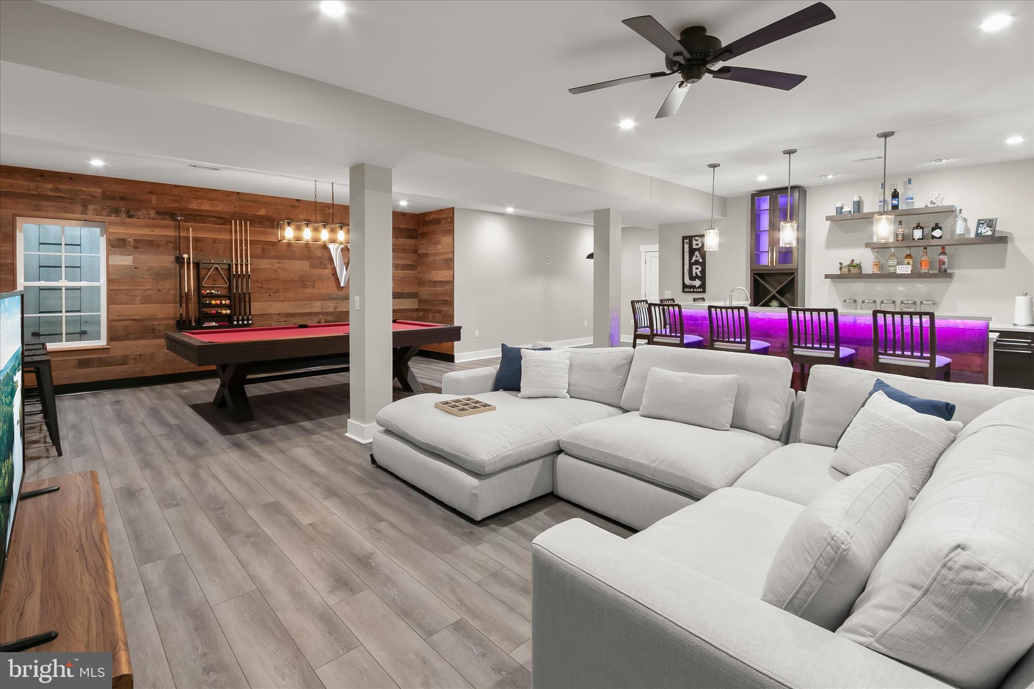 7650 Midtown Road Fulton, MD 20759 - Photo 40 of 76 a living room with furniture and kitchen view