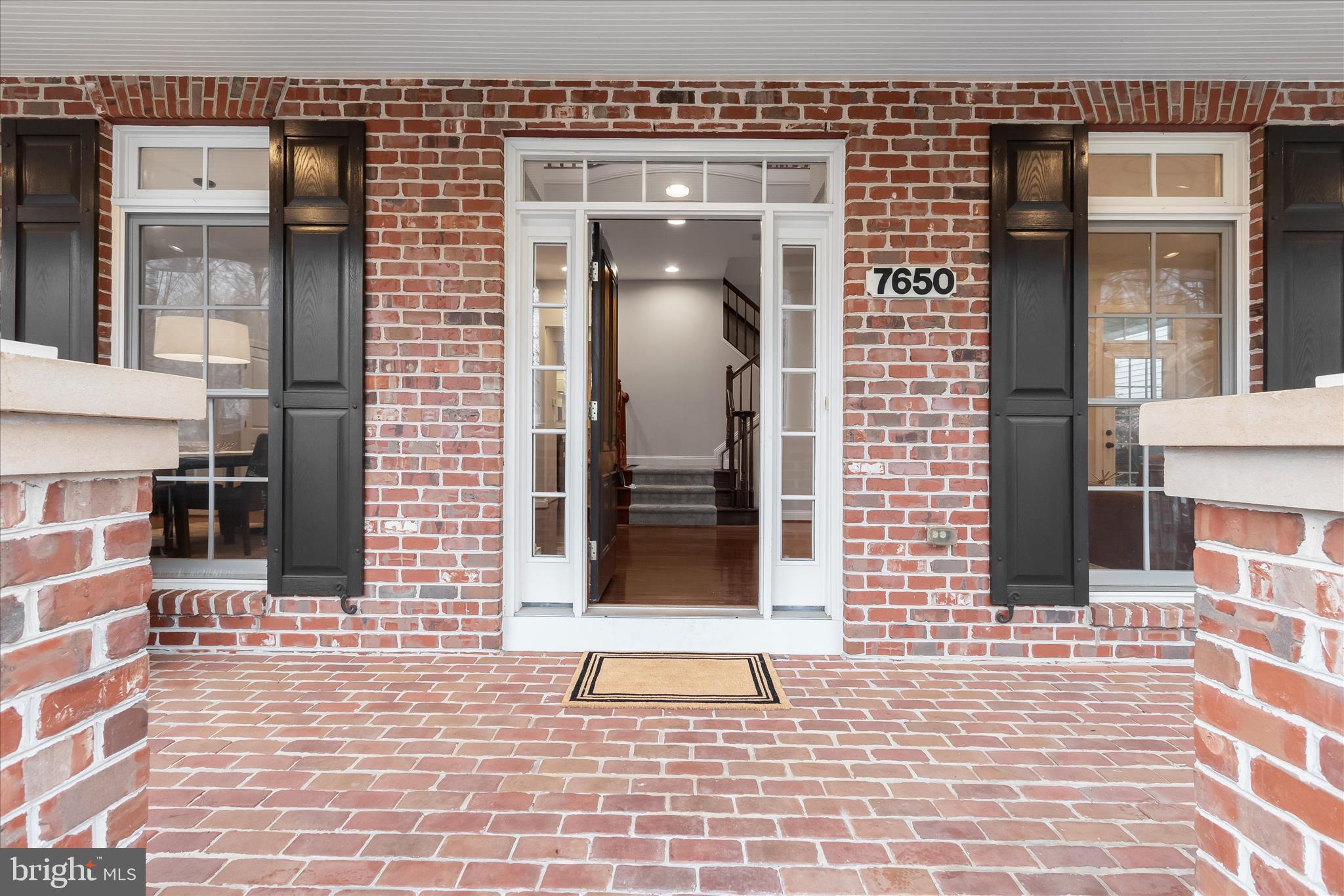 7650 Midtown Road Fulton, MD 20759 - Photo 4 of 76 a view of a brick house with large windows