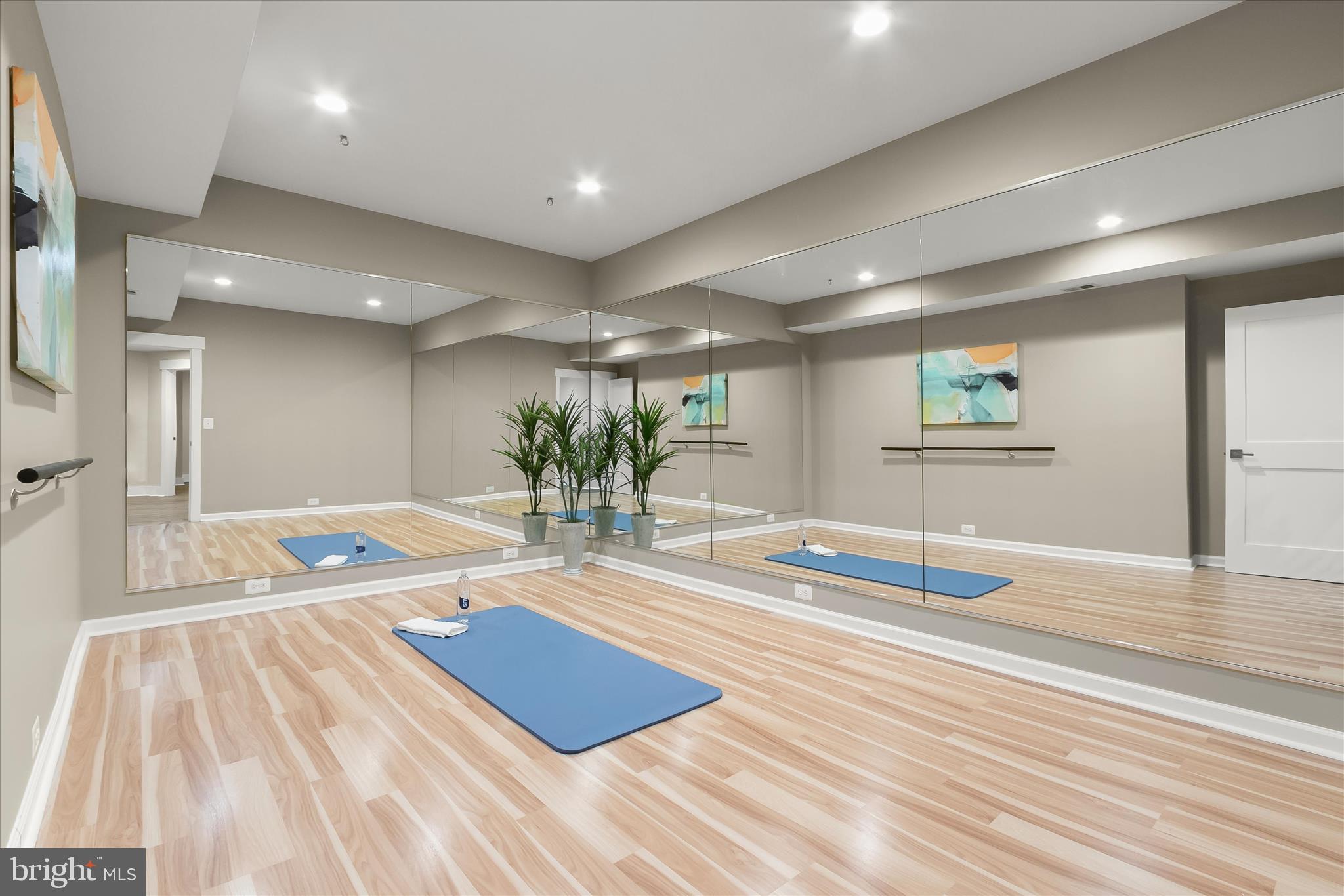 7650 Midtown Road Fulton, MD 20759 - Photo 42 of 76 a room with lots of counter space and a wooden floor