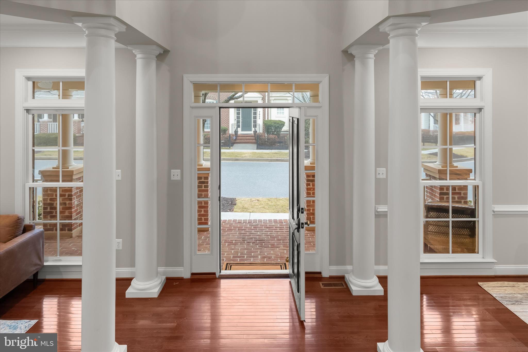 7650 Midtown Road Fulton, MD 20759 - Photo 5 of 76 a view of front door with wooden floor and windows