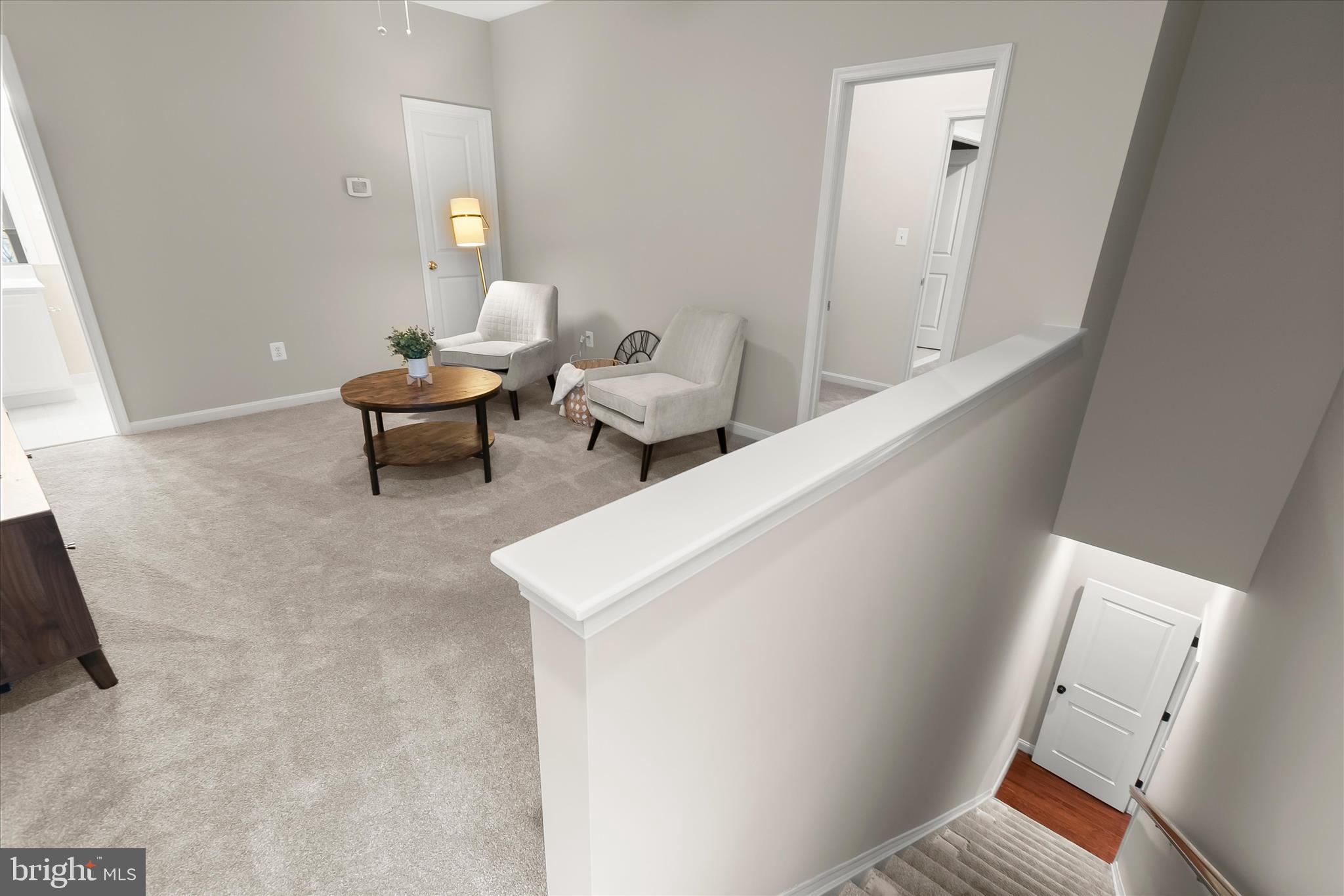 7650 Midtown Road Fulton, MD 20759 - Photo 66 of 76 a living room with furniture and a chair