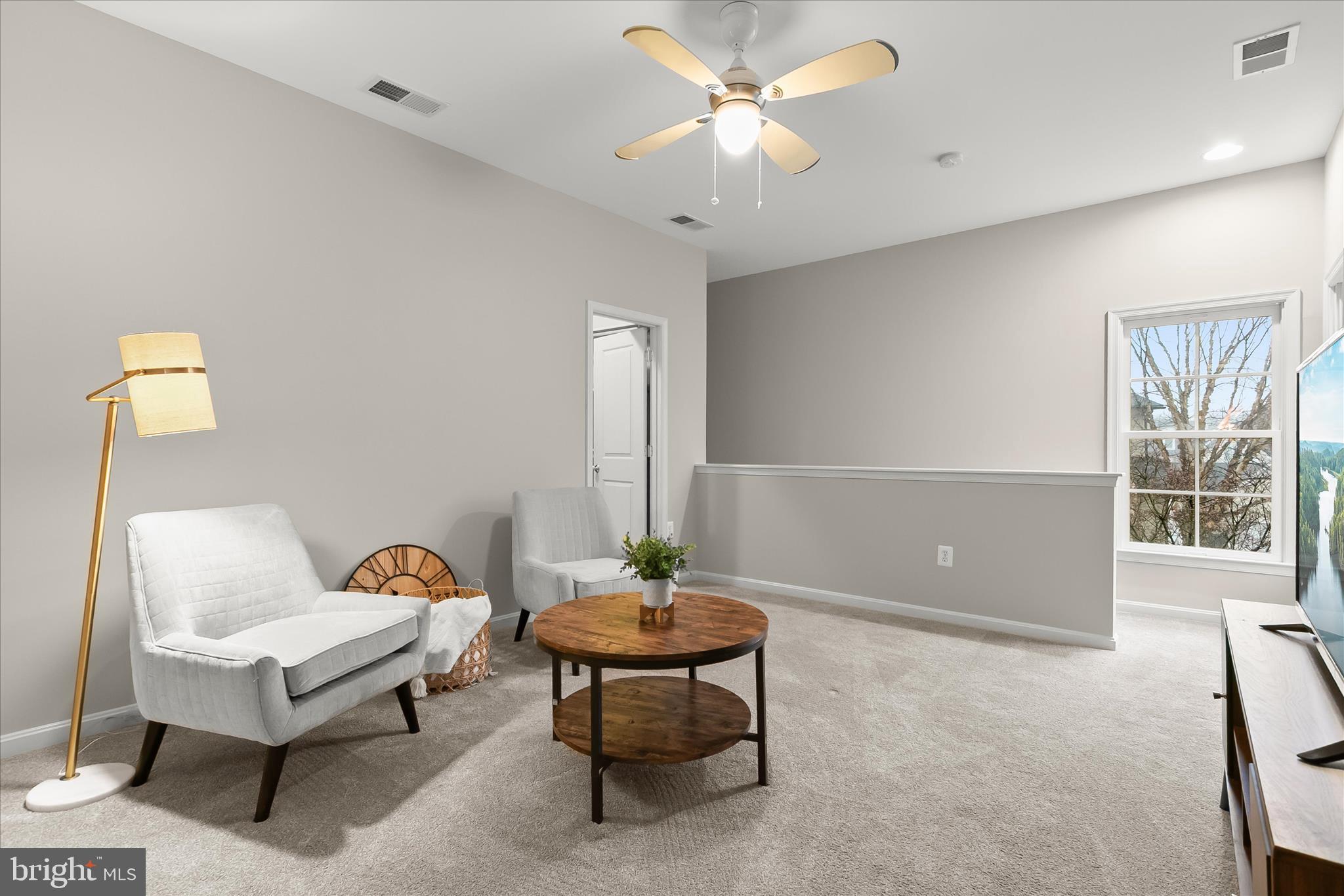 7650 Midtown Road Fulton, MD 20759 - Photo 68 of 76 a living room with furniture and a window