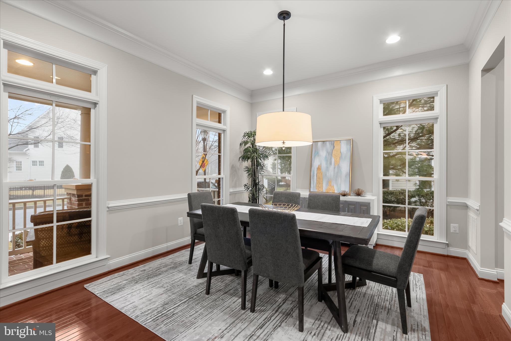 7650 Midtown Road Fulton, MD 20759 - Photo 7 of 76 a view of a dining room with furniture window and wooden floor