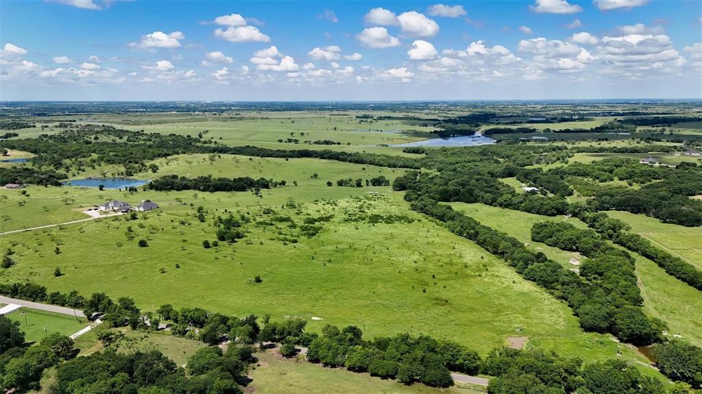 Tbd Alsdorf Road, Unit LOT 2 Ennis, TX 75119 - Photo 4 of 15 Overview of rural landscape featuring a large body of water