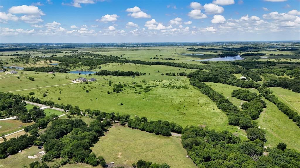 Tbd Alsdorf Road, Unit LOT 2 Ennis, TX 75119 - Photo 5 of 15 View of rural area featuring a nearby body of water