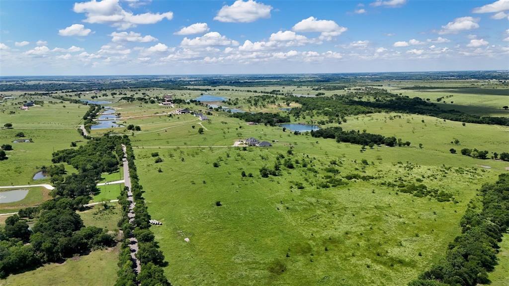 Tbd Alsdorf Road, Unit LOT 2 Ennis, TX 75119 - Photo 6 of 15 Overview of rural landscape with a pastoral area and a nearby body of water