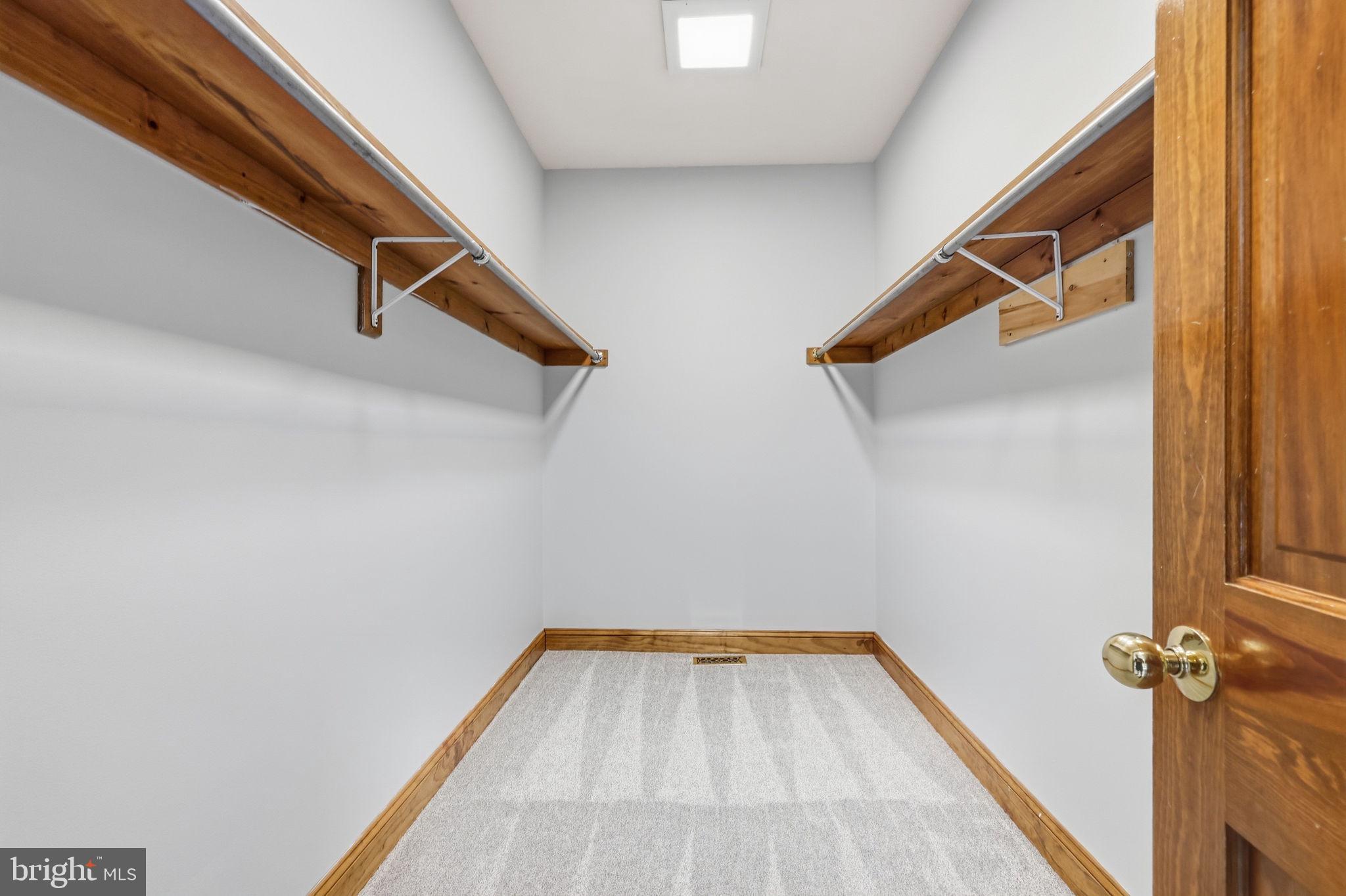 1669 Fennel Road Quakertown, PA 18951 - Photo 37 of 68 Primary bedroom walk-in closet with solar tube