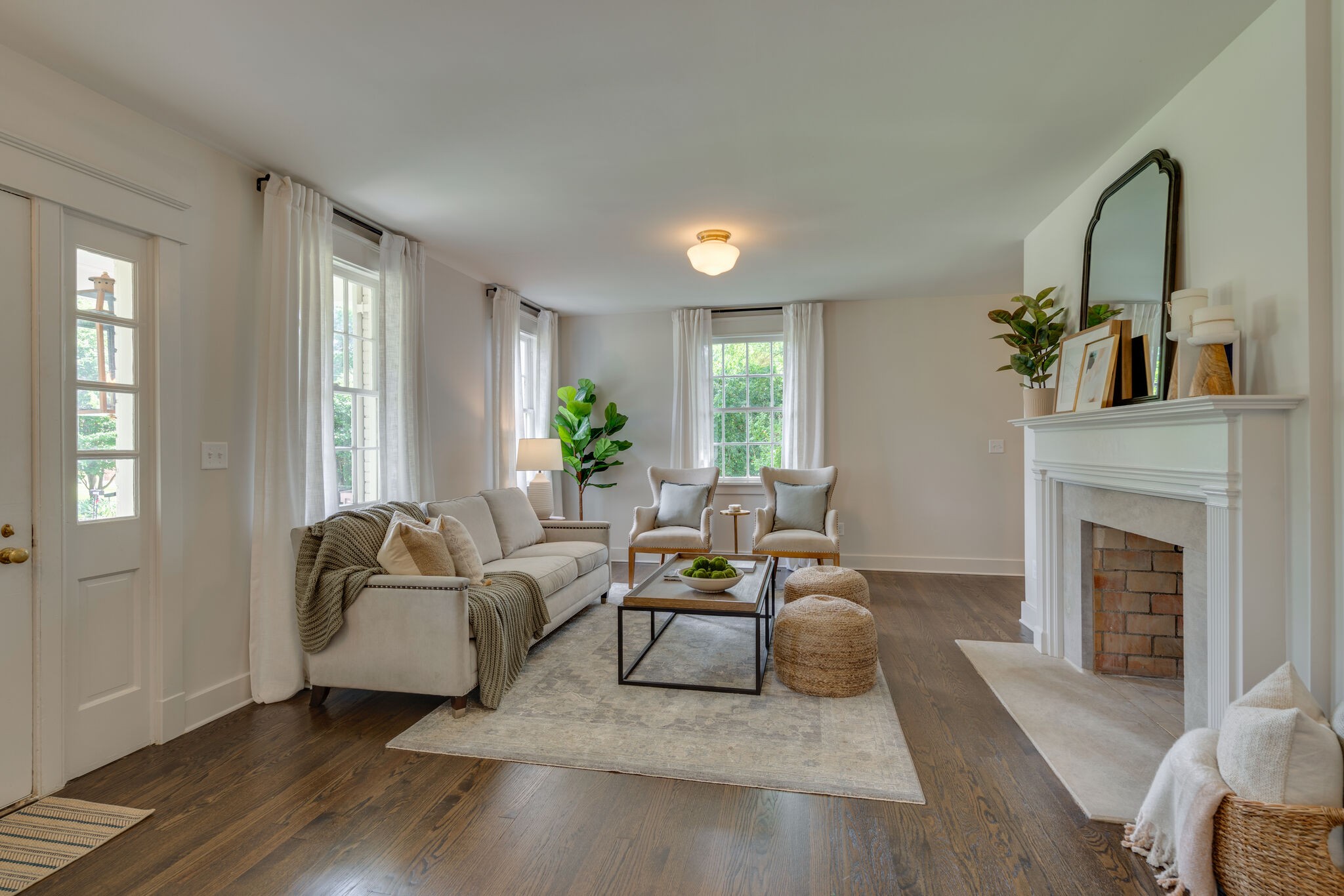 249 Lauderdale Road Nashville, TN 37205 - Photo 12 of 66 a living room with furniture and a fireplace
