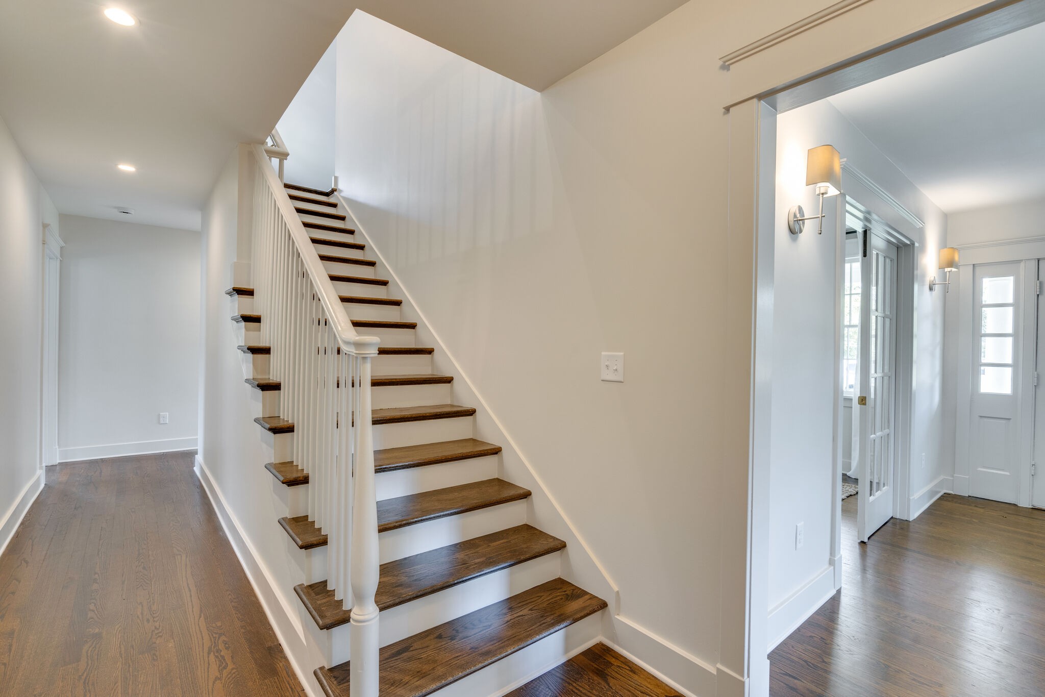 249 Lauderdale Road Nashville, TN 37205 - Photo 24 of 66 a view of a hallway with white walls and wooden floor