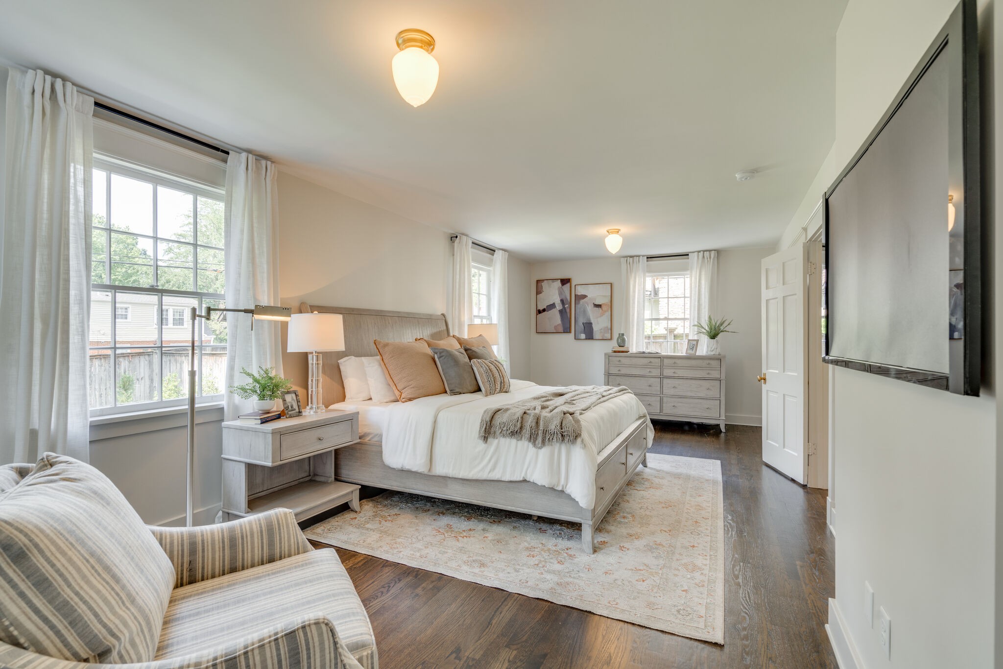 249 Lauderdale Road Nashville, TN 37205 - Photo 26 of 66 a spacious bedroom with a bed couch and a window
