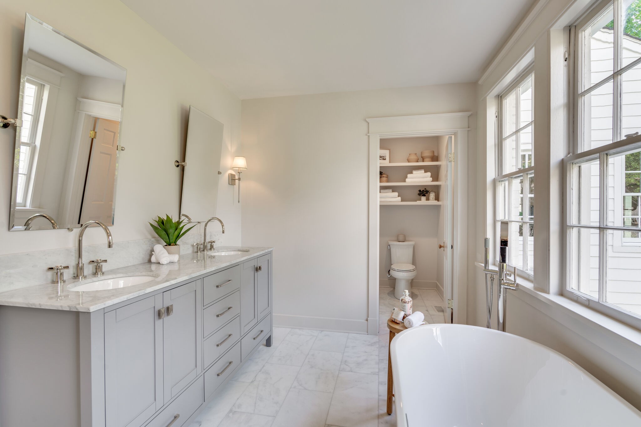 249 Lauderdale Road Nashville, TN 37205 - Photo 30 of 66 a bathroom with a double vanity sink and a mirror