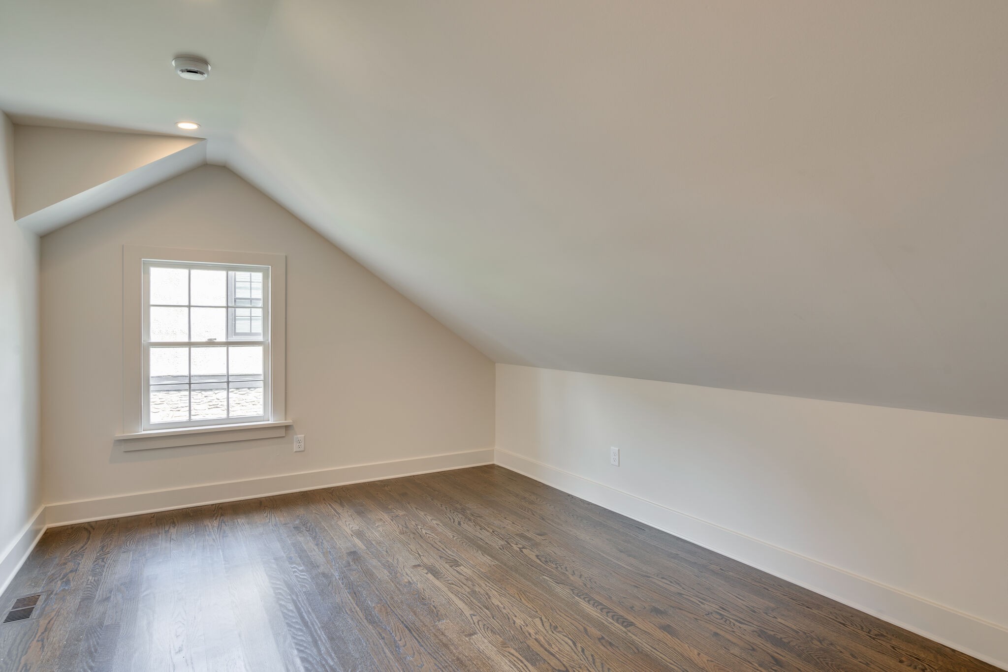 249 Lauderdale Road Nashville, TN 37205 - Photo 36 of 66 an empty room with wooden floor and windows