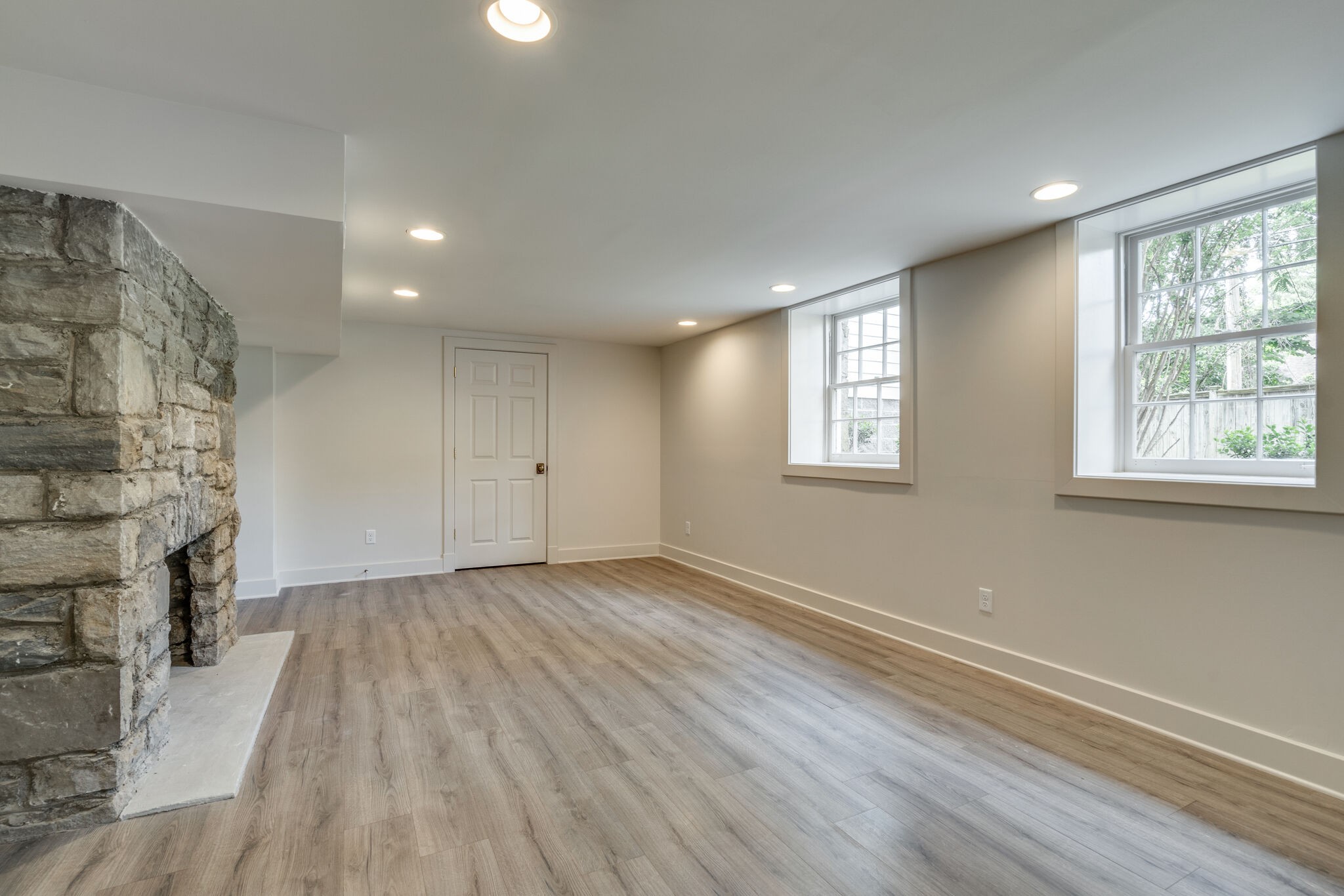 249 Lauderdale Road Nashville, TN 37205 - Photo 52 of 66 a view of an empty room with wooden floor and a window