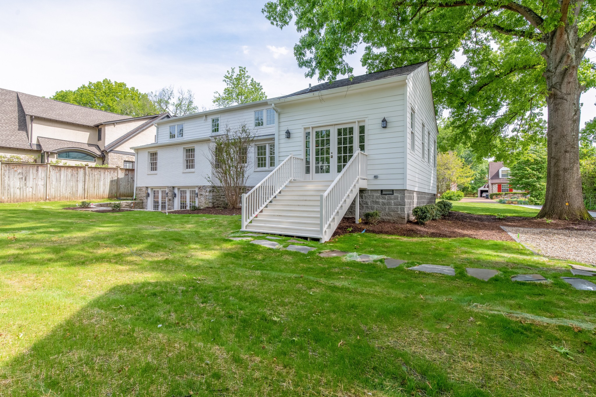 249 Lauderdale Road Nashville, TN 37205 - Photo 6 of 66 a view of a house with a yard and sitting area