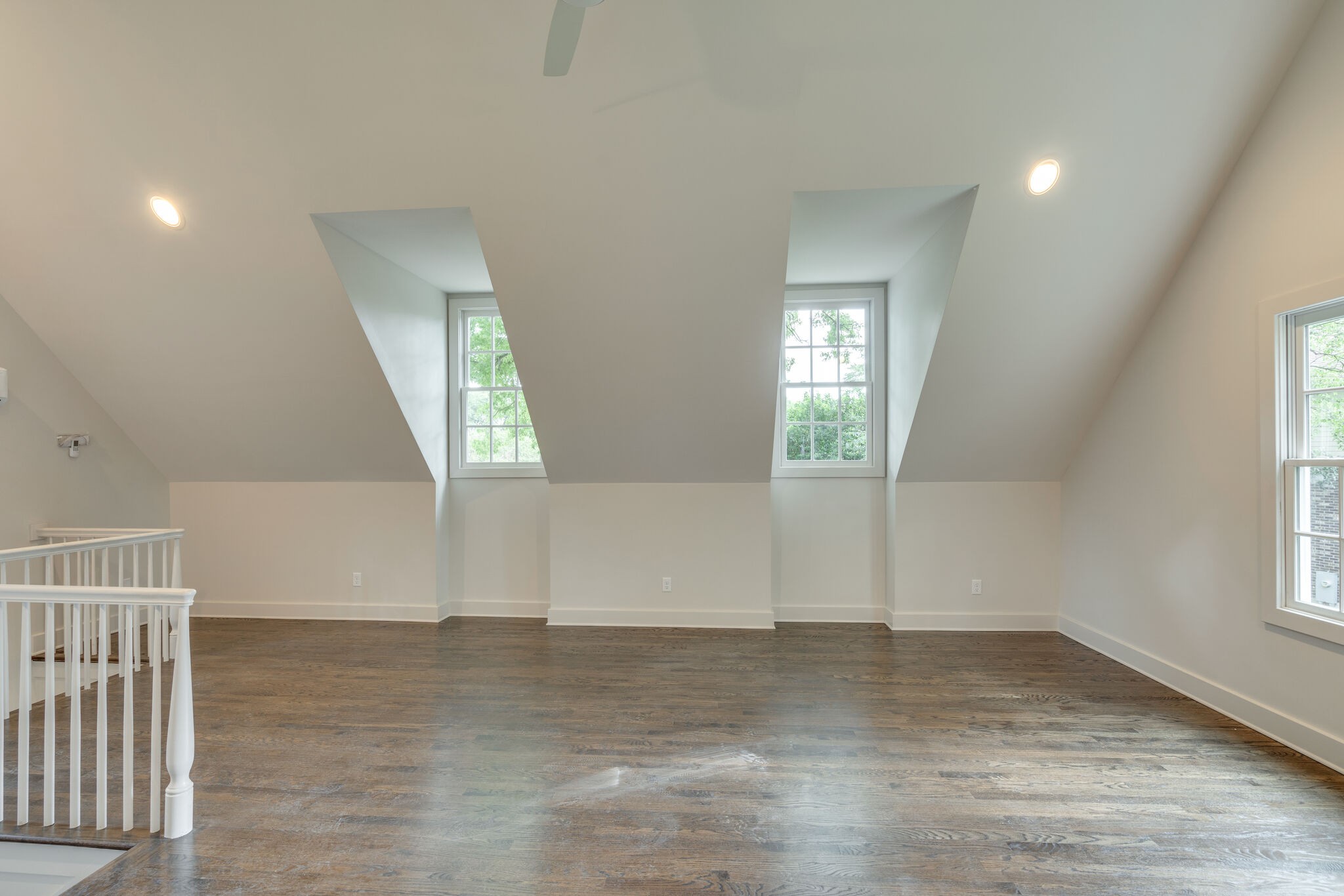 249 Lauderdale Road Nashville, TN 37205 - Photo 62 of 66 an empty room with wooden floor and windows