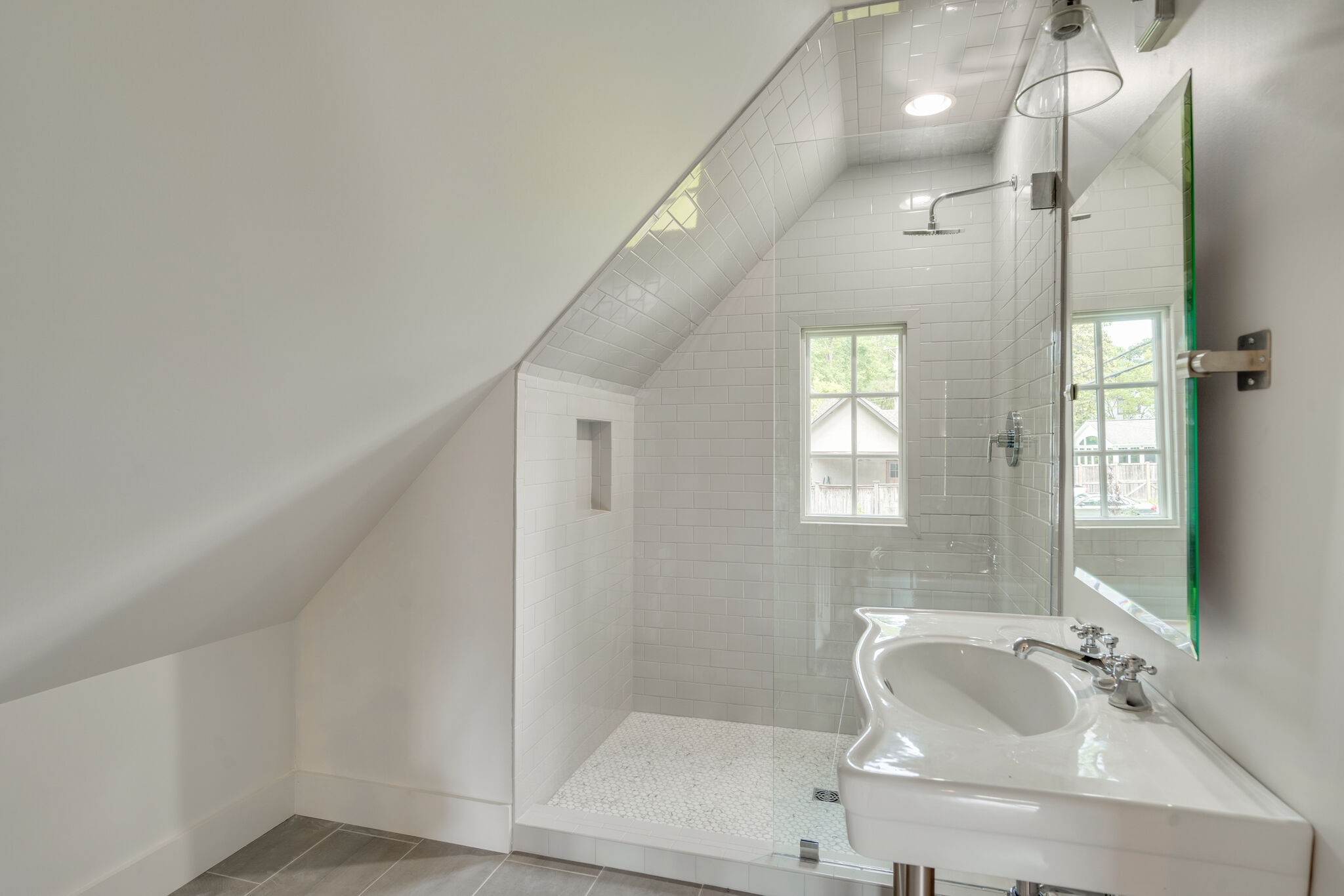 249 Lauderdale Road Nashville, TN 37205 - Photo 63 of 66 a bathroom with a tub sink and mirror