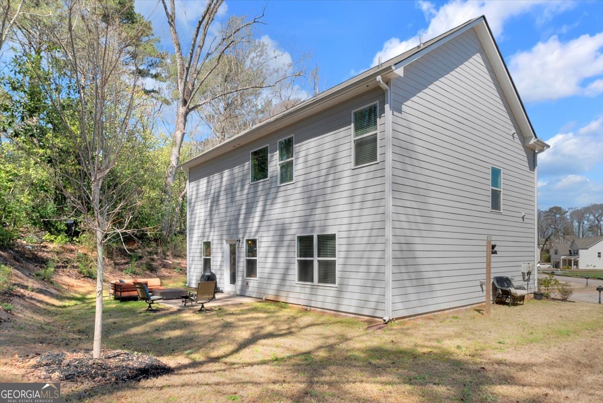 2099 Easterwood Court Decatur, GA 30032 - Photo 28 of 38 a view of a house with a patio