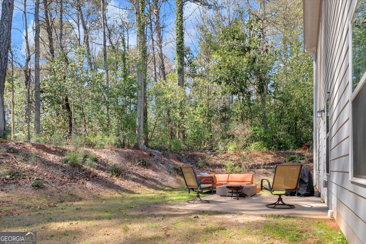 2099 Easterwood Court Decatur, GA 30032 - Photo 30 of 38 a view of a swimming pool with a lounge chair