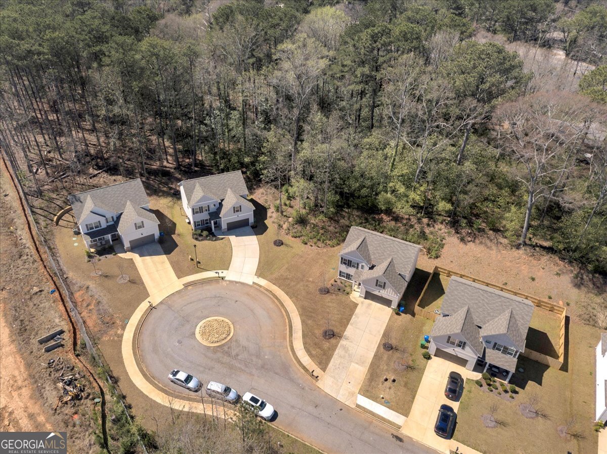 2099 Easterwood Court Decatur, GA 30032 - Photo 33 of 38 an aerial view of a house with garden space and parking