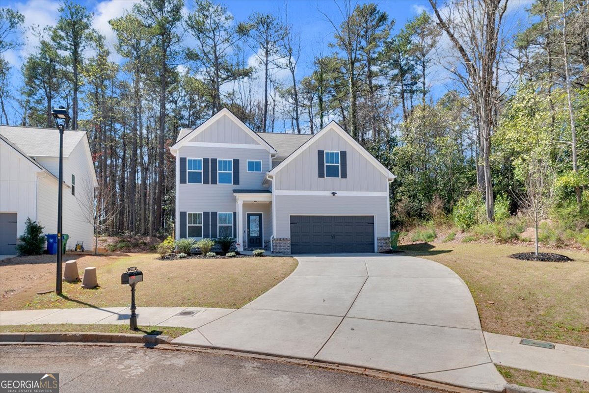 2099 Easterwood Court Decatur, GA 30032 - Photo 4 of 38 a front view of a house with a yard