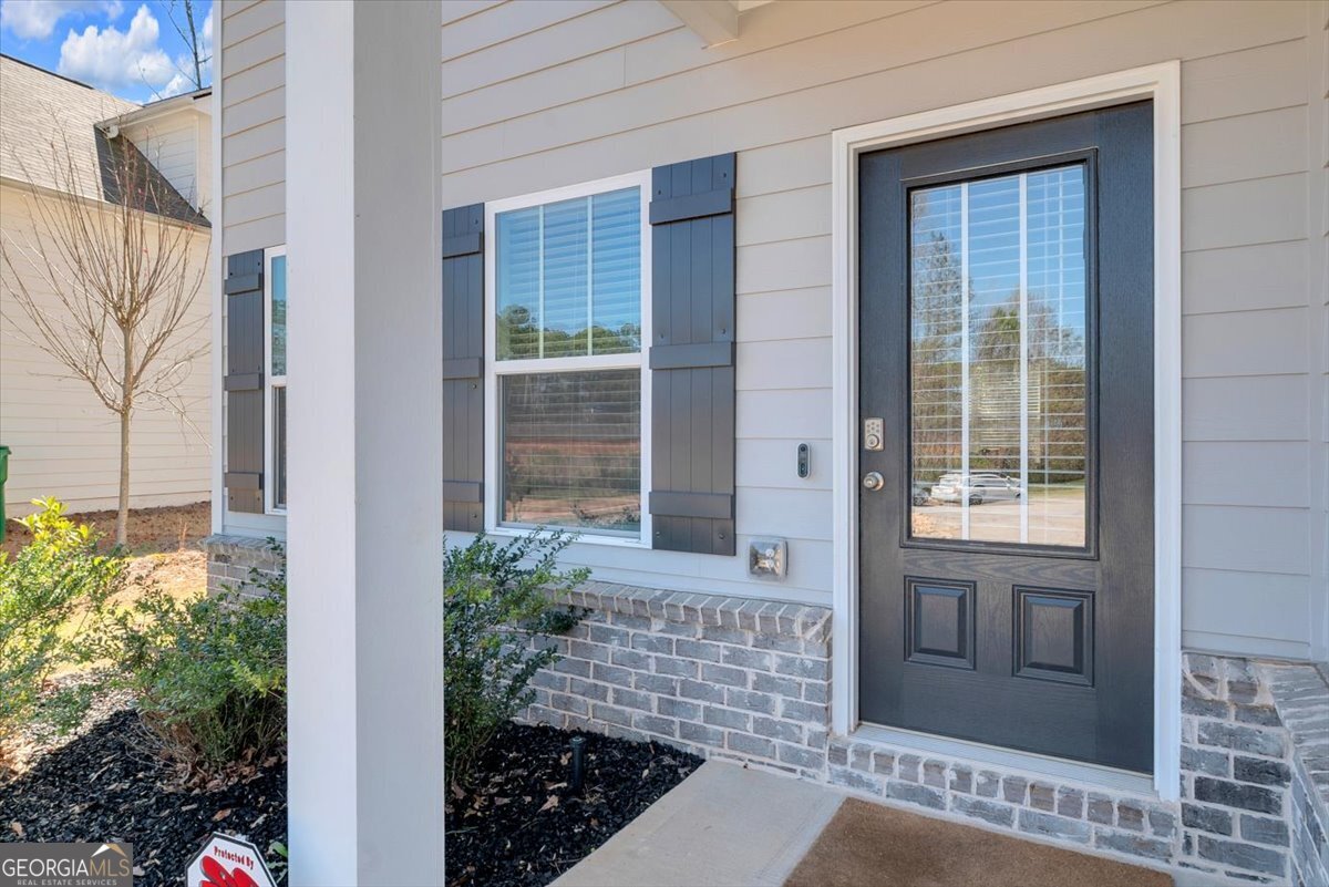 2099 Easterwood Court Decatur, GA 30032 - Photo 5 of 38 a front view of a house with a glass door