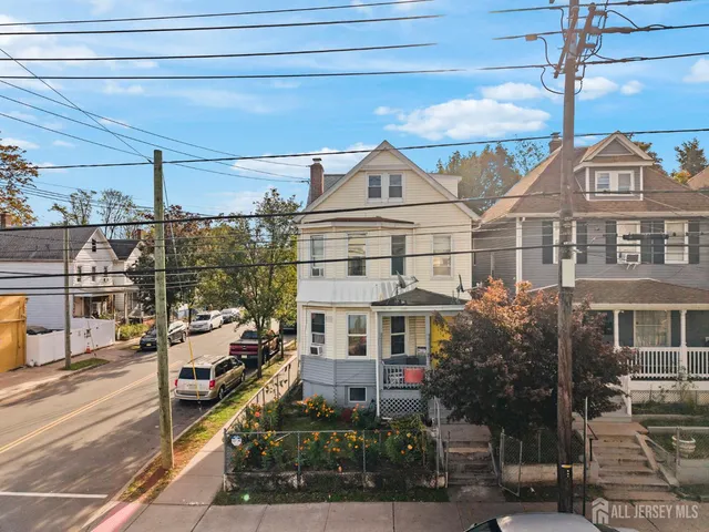 a front view of a building with street view