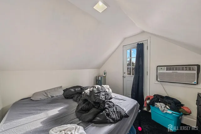 a bed room with a bed and a couch