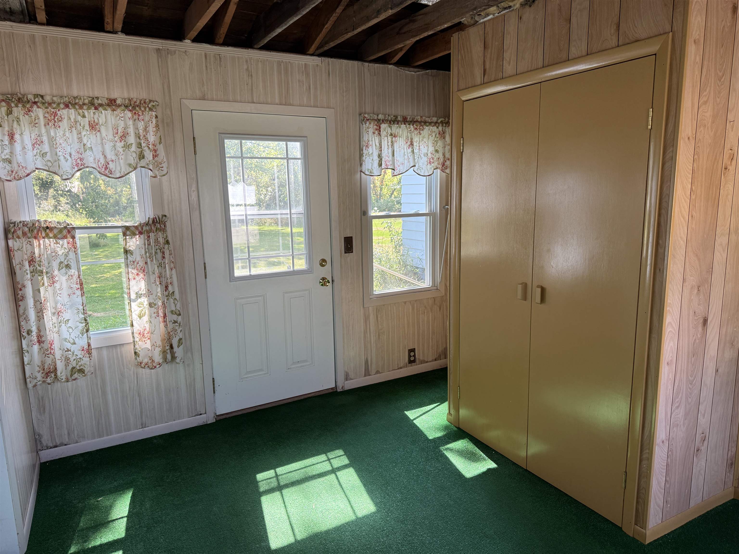 3018 West Beaver Road Freeport, IL 61032 - Photo 21 of 26 a view of an entryway with a garden
