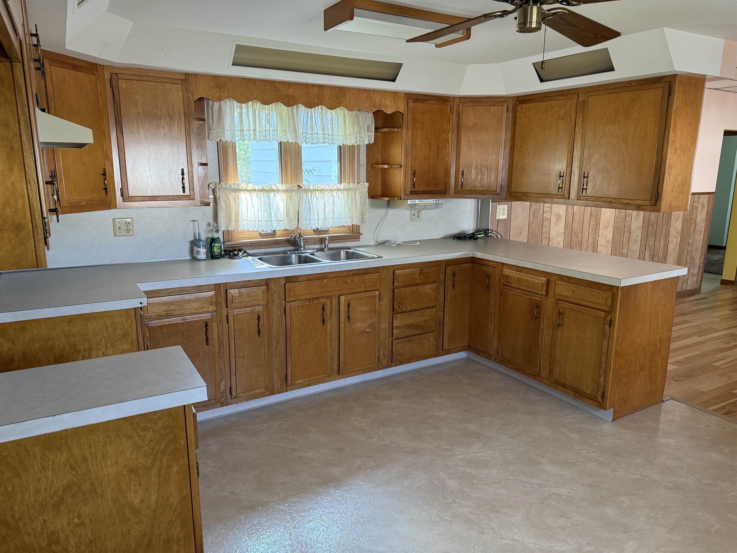 3018 West Beaver Road Freeport, IL 61032 - Photo 4 of 26 a kitchen with a sink a stove and cabinets
