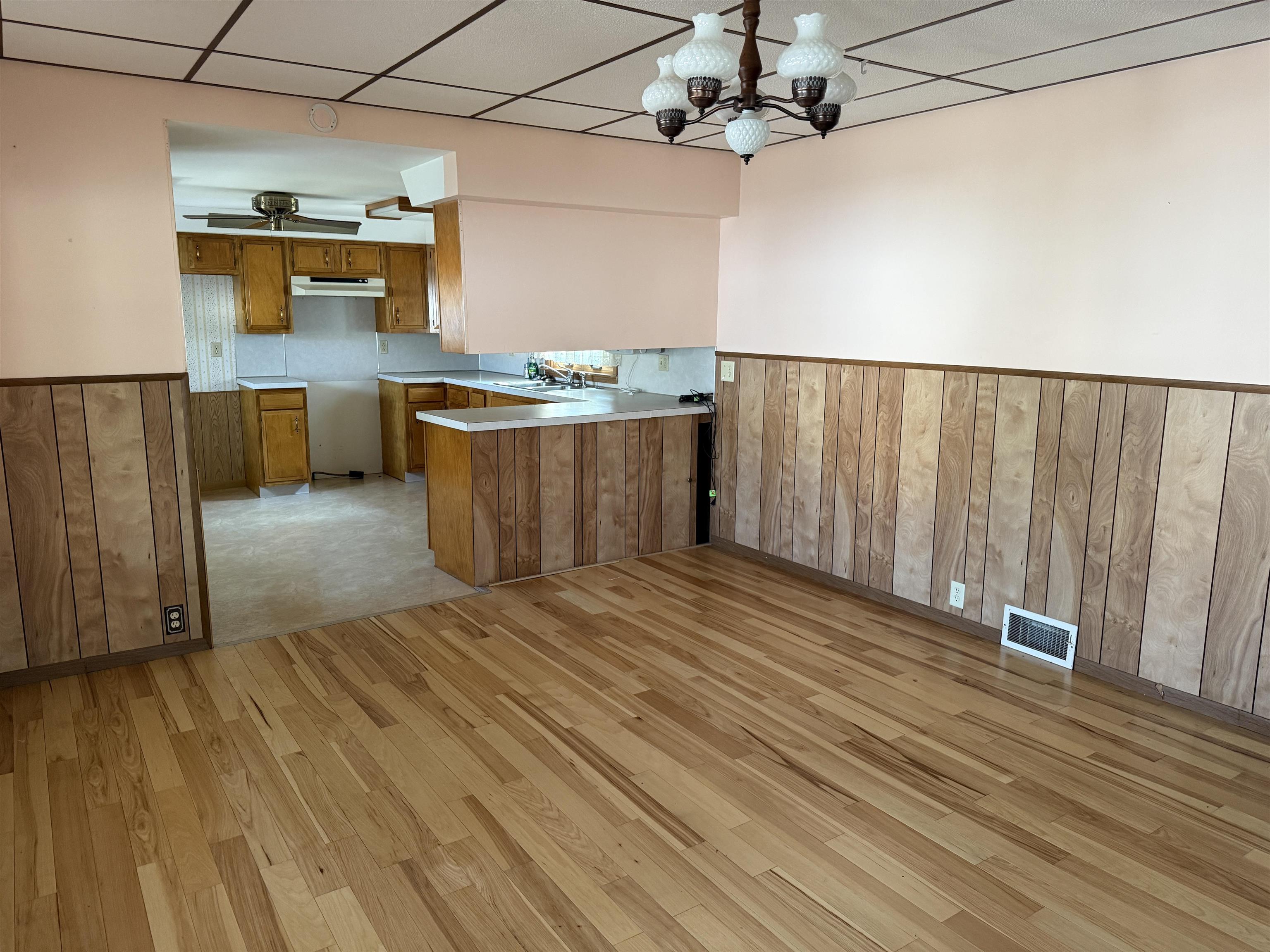 3018 West Beaver Road Freeport, IL 61032 - Photo 8 of 26 a view of a room with wooden floor