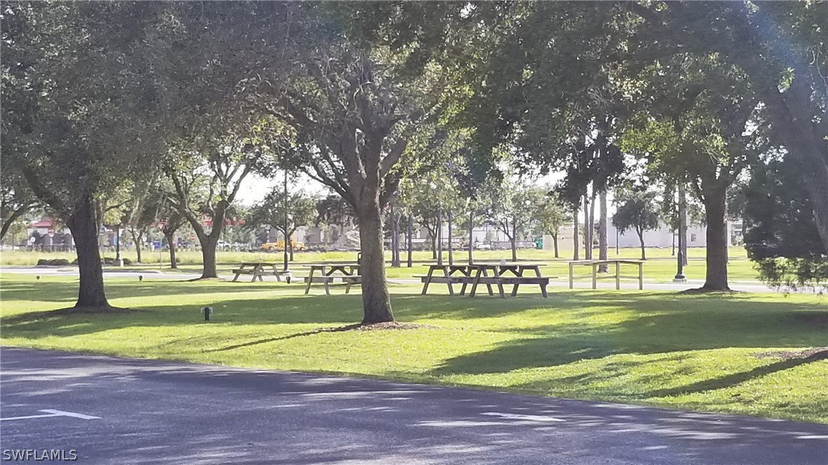 971128607 Embassy Road North Port, FL 34291 - Photo 18 of 43 a view of a park with large trees