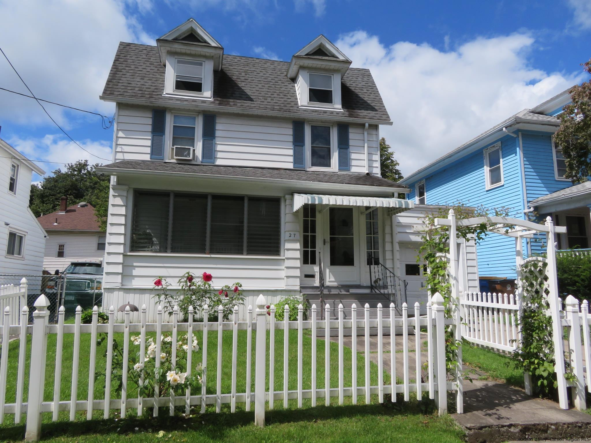 27 Pine Street Kingston, NY 12401 - Photo 1 of 32 a front view of a house with a yard