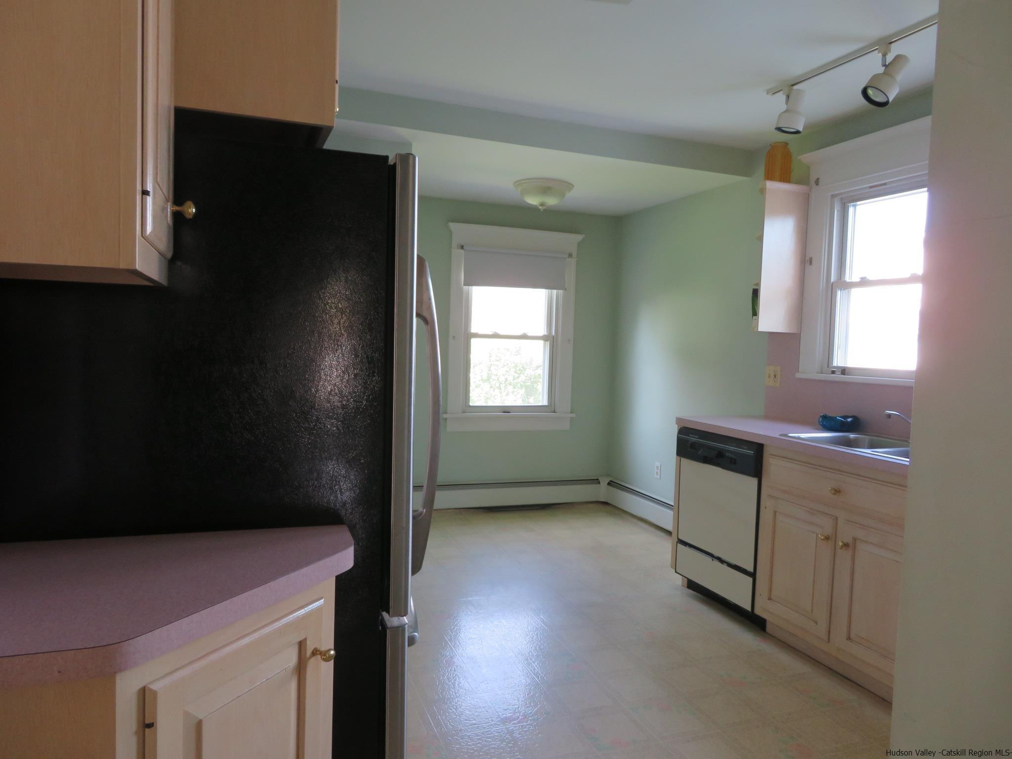 27 Pine Street Kingston, NY 12401 - Photo 15 of 32 a room with cabinets and a window