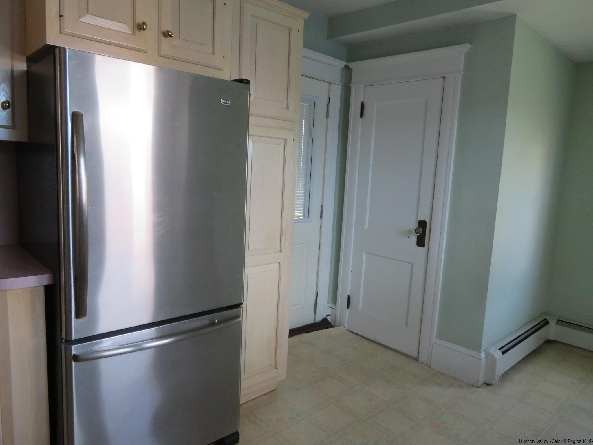 27 Pine Street Kingston, NY 12401 - Photo 16 of 32 a view of a refrigerator in kitchen and dishwasher