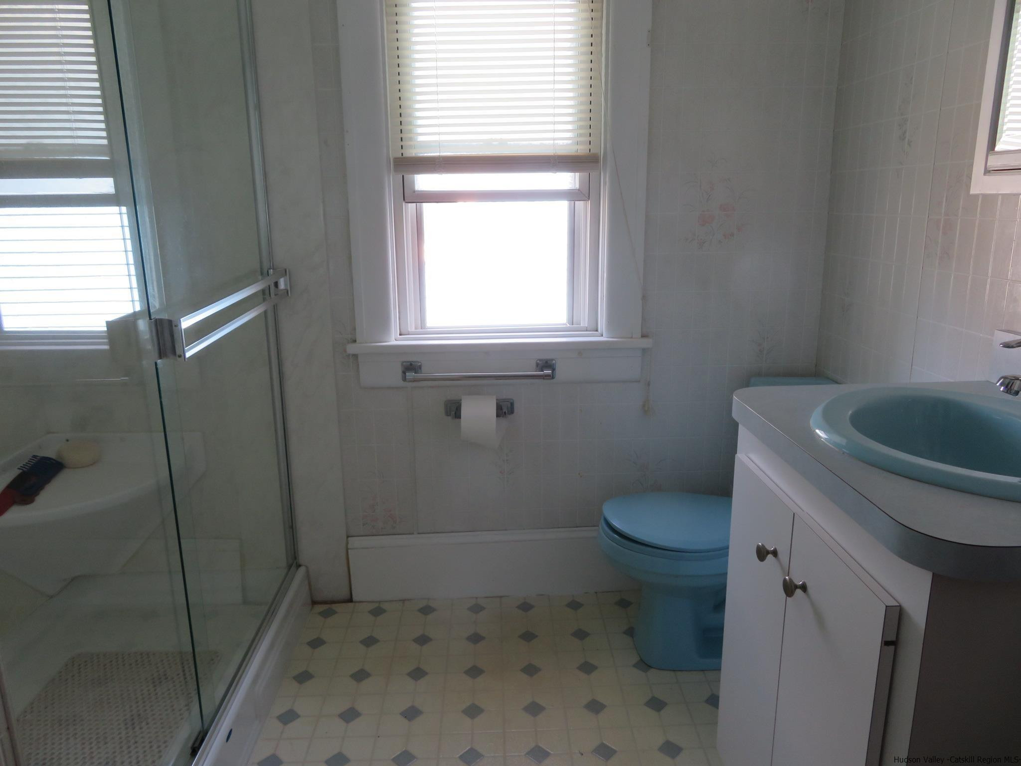 27 Pine Street Kingston, NY 12401 - Photo 26 of 32 a bathroom with a toilet and a shower