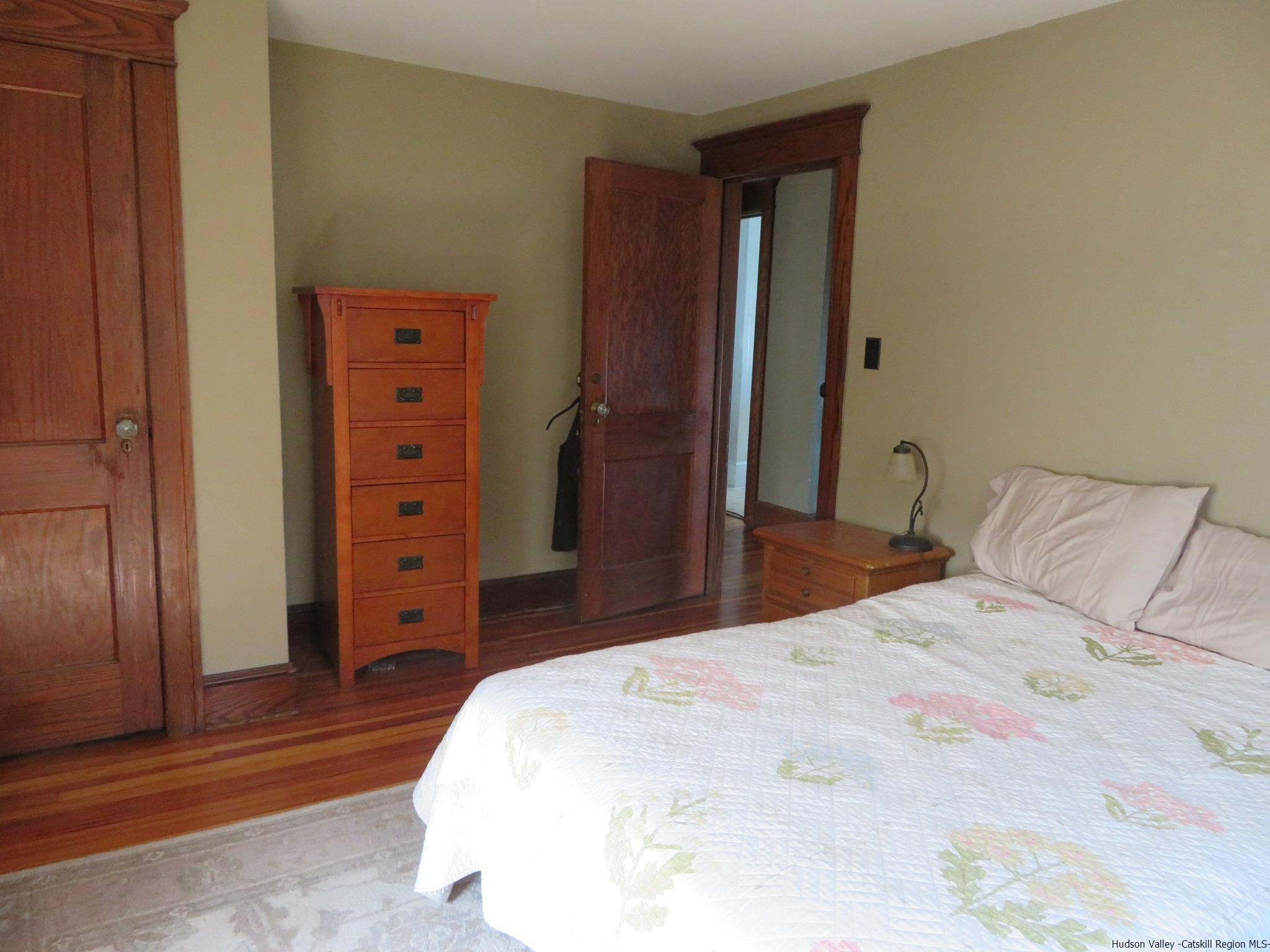 27 Pine Street Kingston, NY 12401 - Photo 28 of 32 a bedroom with a bed and a dresser