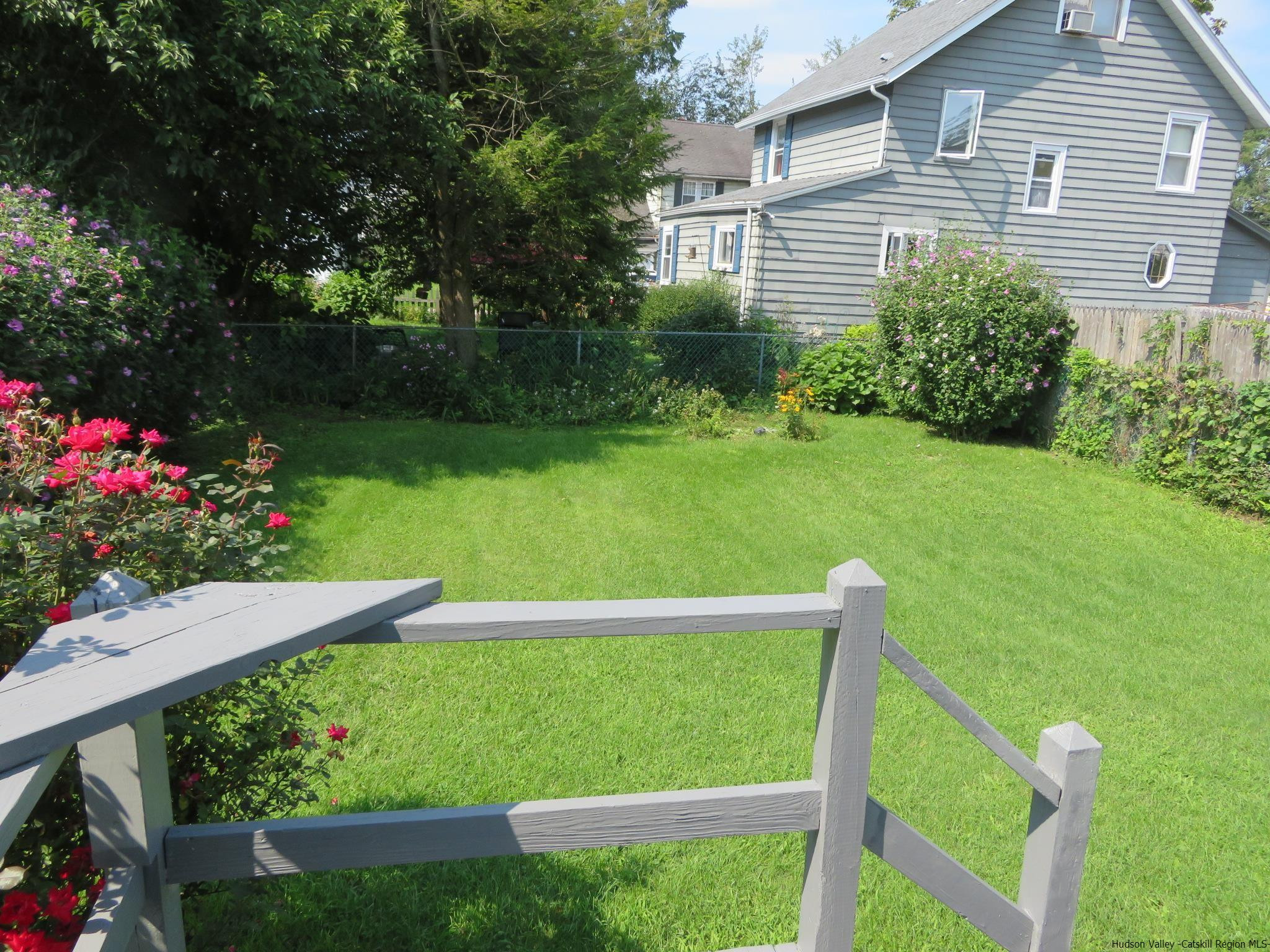 27 Pine Street Kingston, NY 12401 - Photo 31 of 32 a view of a house with a yard and plants