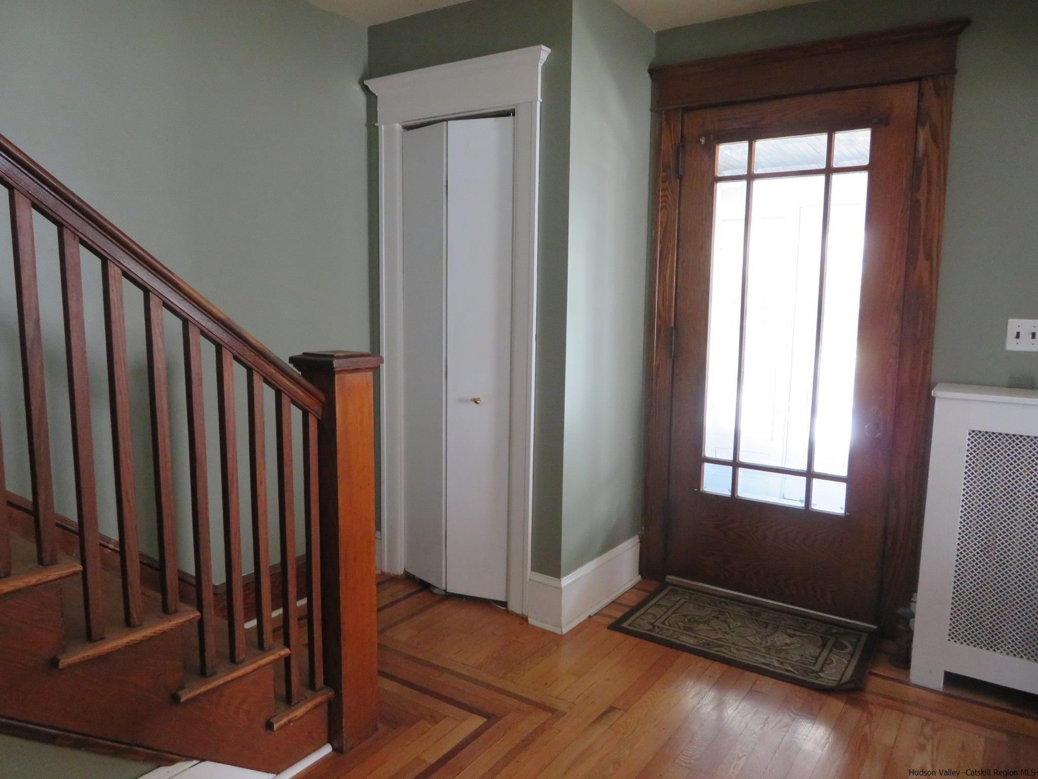 27 Pine Street Kingston, NY 12401 - Photo 6 of 32 a view of an empty room with wooden floor